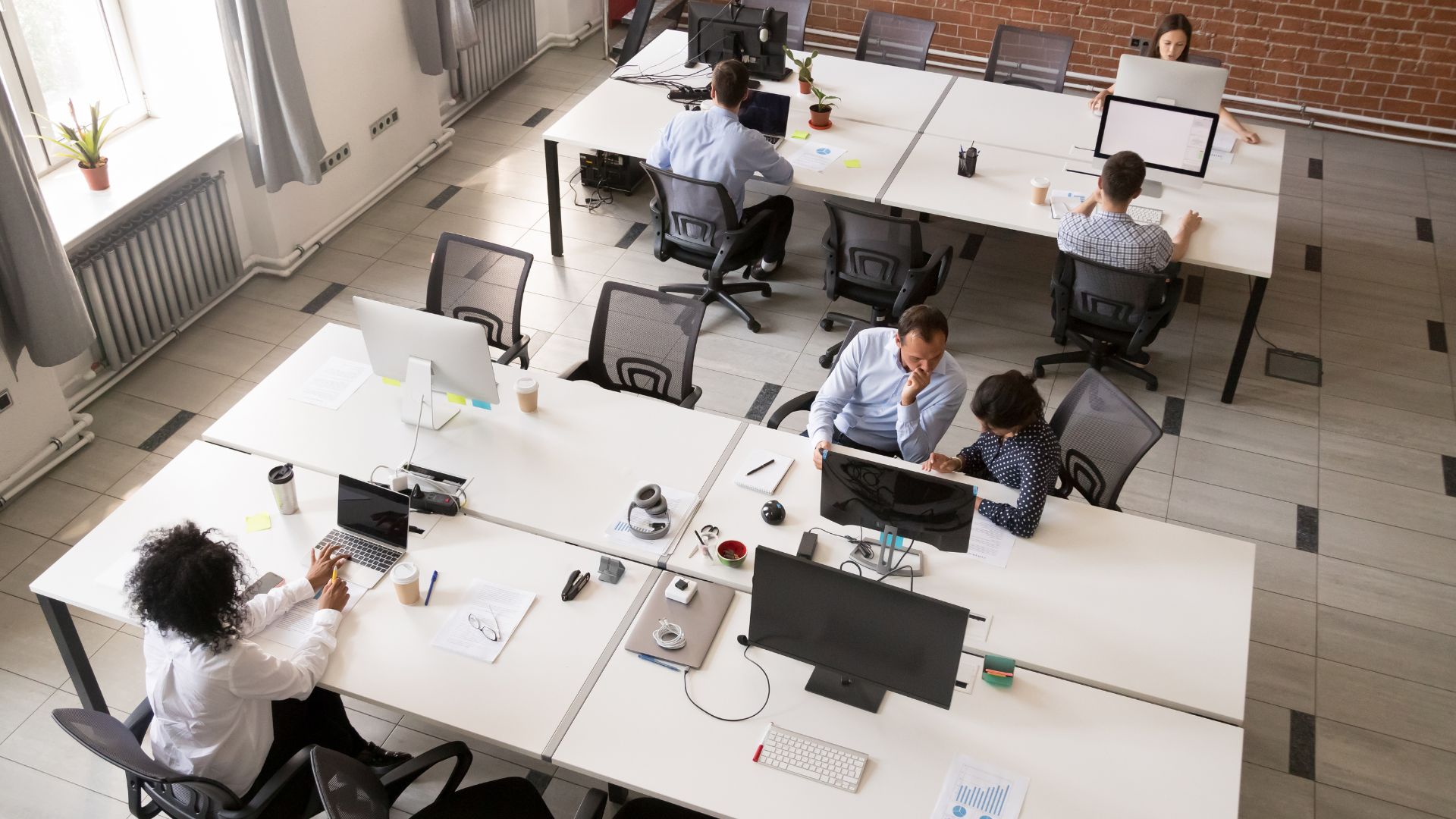 Les collaborateurs de Gestion De La Paie travaillent dans un Open Space